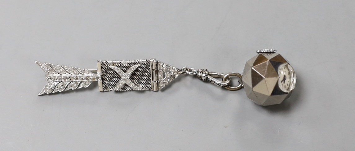 A 1920's mesh white metal and rose cut diamond chip set suspension brooch, with arrow head and quiver terminals, now hung with a later steel? Uti fob watch.